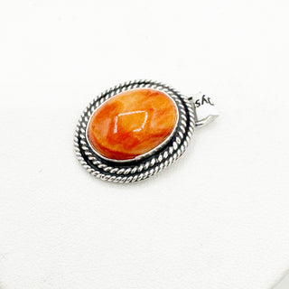 Jason Ogg Spiny Oyster and Pink Conch Charms