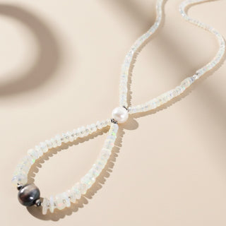 Necklace with pearls on a beige background