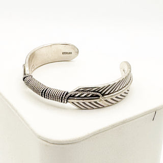 Jason Ogg Feather Cuffs