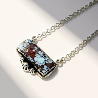 Turquoise necklace on a beige background