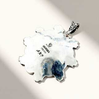 Pendant with 'Jewelry' label on a light gray background