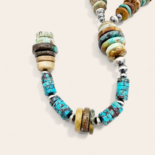 Necklace with multicolored beads on a white background