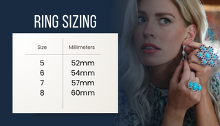 Woman wearing jewelry next to a ring sizing chart on a blue background