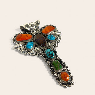 Multicolor pendant on a beige background