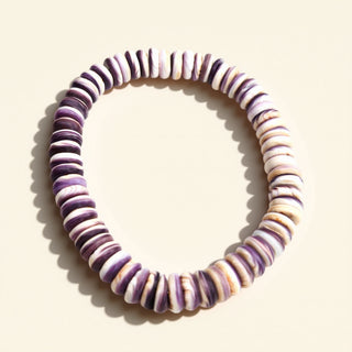 Multicolored beaded bracelet on a light background